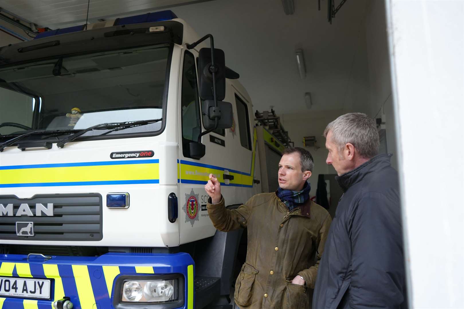 MP Andrew Bowie with Aboyne fire station.Watch Commander Alastair Griffiths