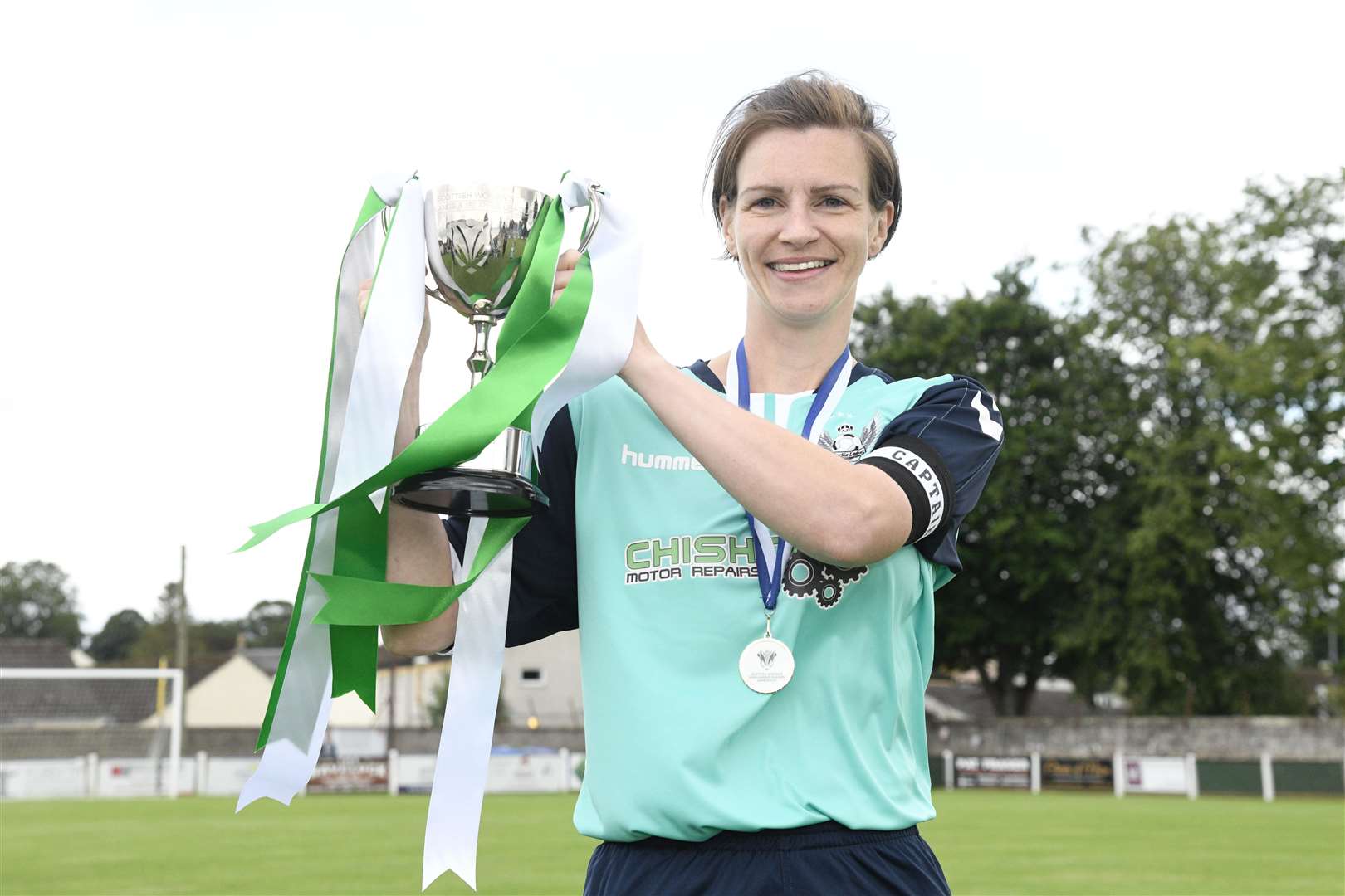 Gemma Geddes lifts the Highlands and Islands League Cup. Picture: Daniel Forsyth