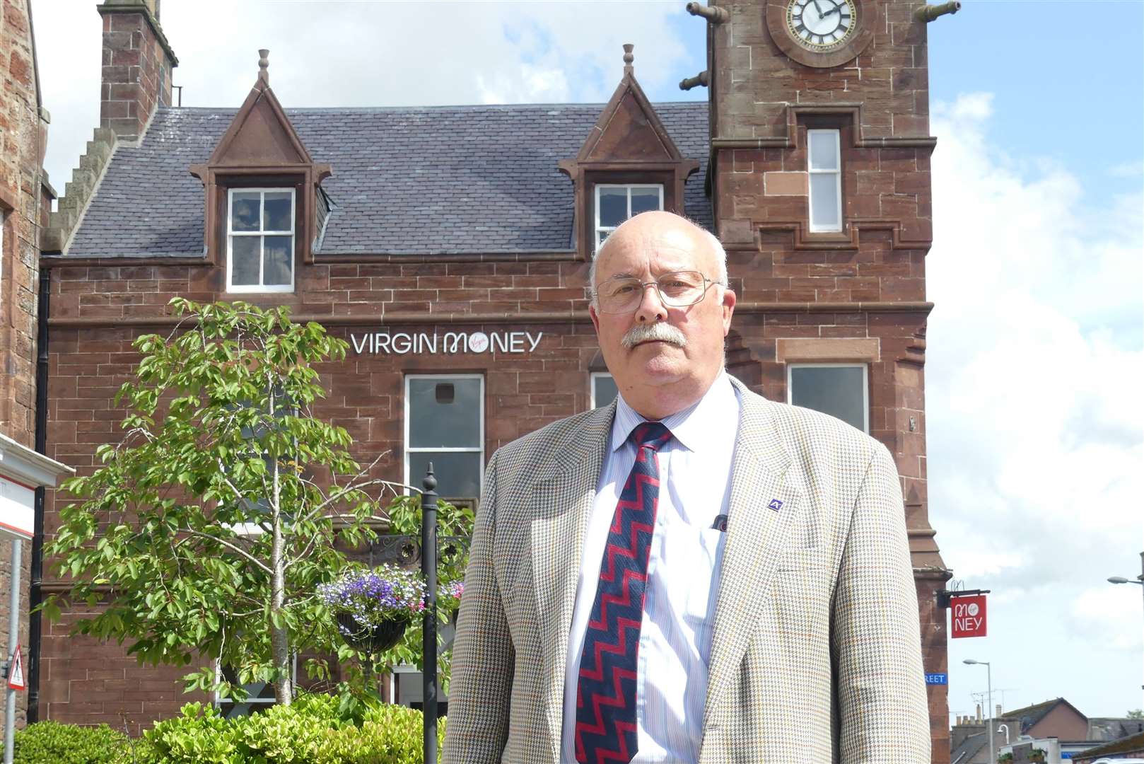 Councillor Alastair Forsyth outside the bank in Turriff which has closed its doors for the final time.
